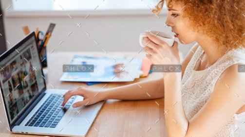 demo attachment 218 woman photographer drinking coffee and working pjnbp6u@2x